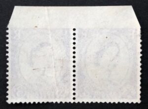 QEII 3d deep lilac pair with imperf between stamp and top margin