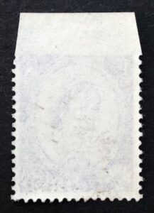 QEII 3d deep lilac with imperf between stamp and top margin - U/M